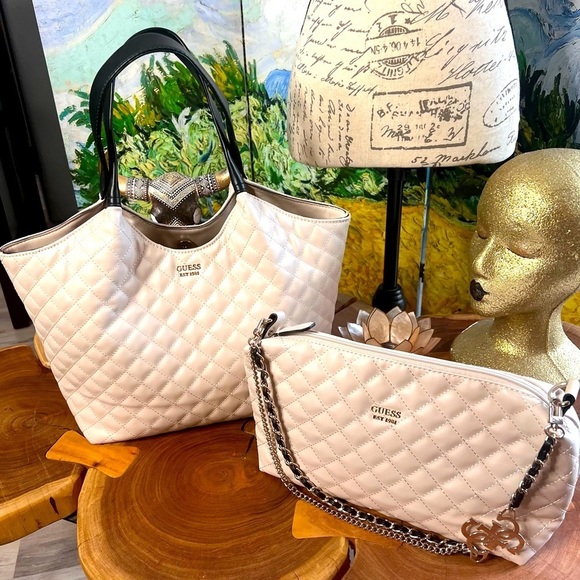 Guess EST 1981 Handbags - Guess two-piece purse set with leather and metal straps.